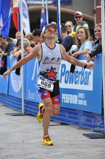 Vlad running hard during an Ironman race